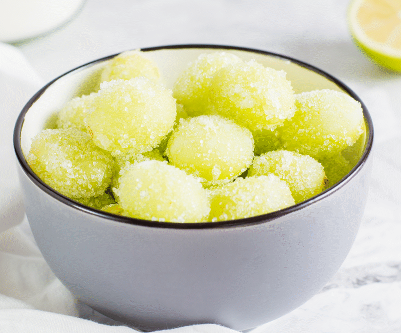 Feestelijke snacks voor oud & nieuw: prosecco-druiven en gesuikerde cranberries