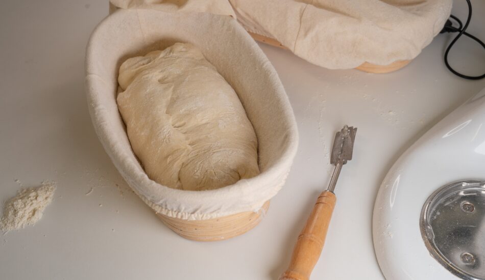 Proofing,Basket,,Bannetons,Bread,Score,On,White,Table